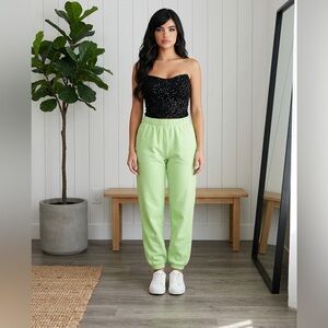 EUC Brandy Melville Green joggers green cuffs on bottom